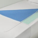 Wasbare bed onderlegger met instopstroken